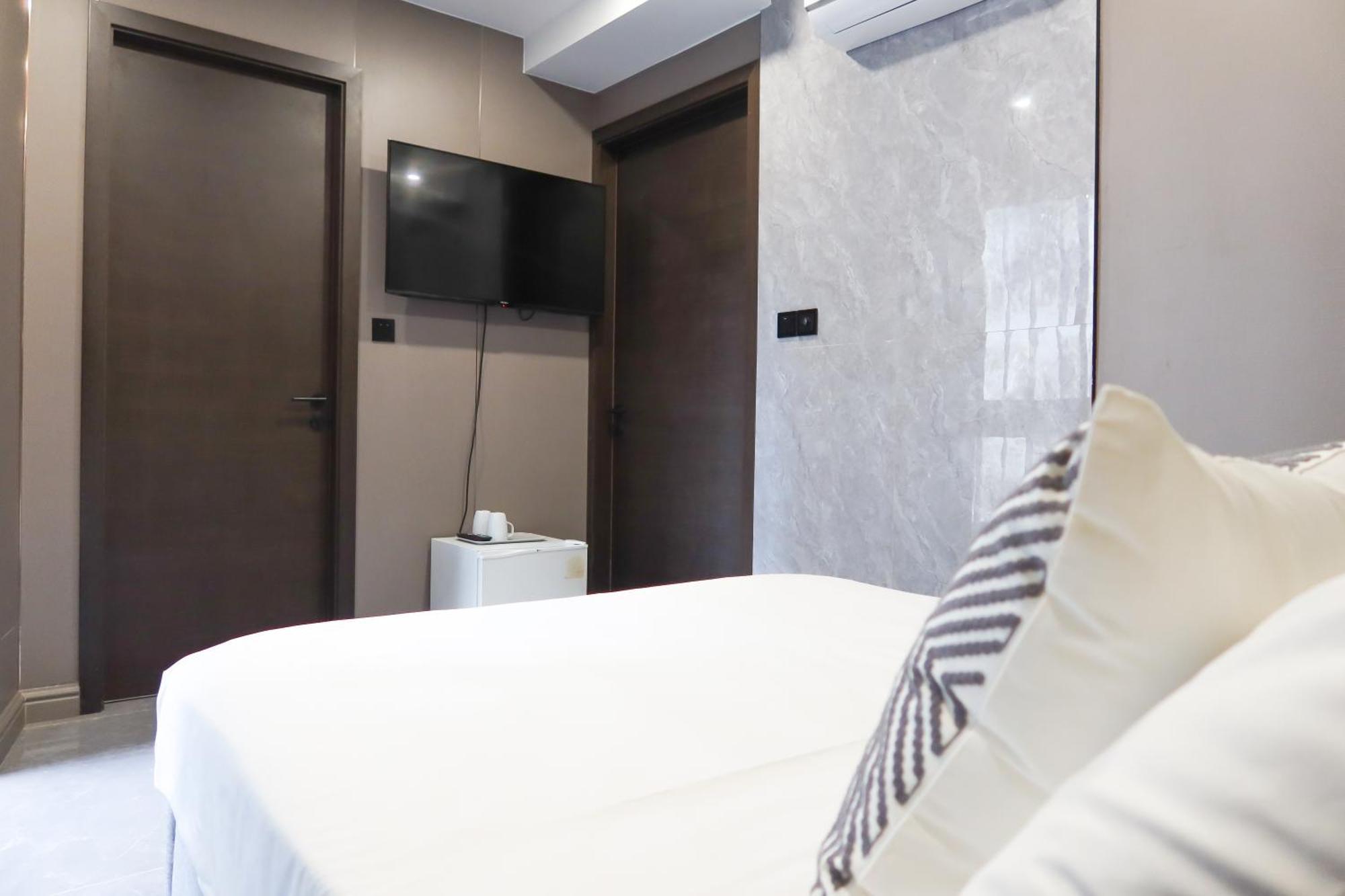 Recharge Studio Apartment & Suites Singapur Zimmer foto
