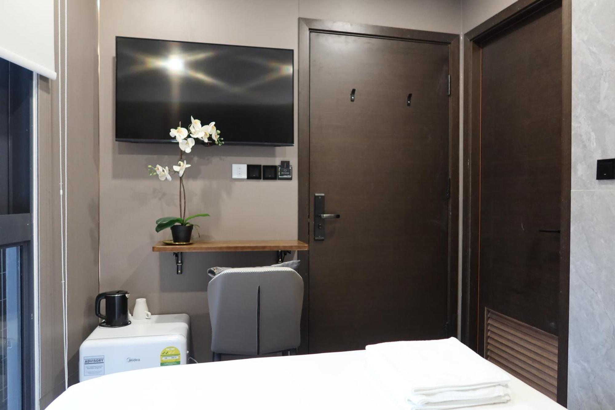 Recharge Studio Apartment & Suites Singapur Zimmer foto