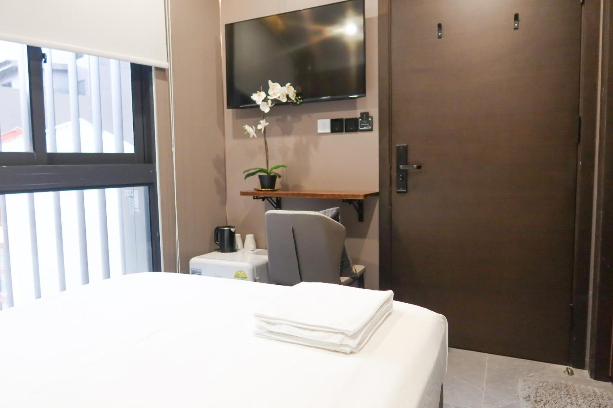 Recharge Studio Apartment & Suites Singapur Zimmer foto